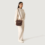 Sandra Vintage Leather Saddle Bag for Women | Distressed Brown Cowhide with Twist Lock and Detachable Strap